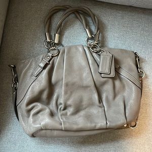COACH handbag. Can be used over the shoulder or carried. Grey color.